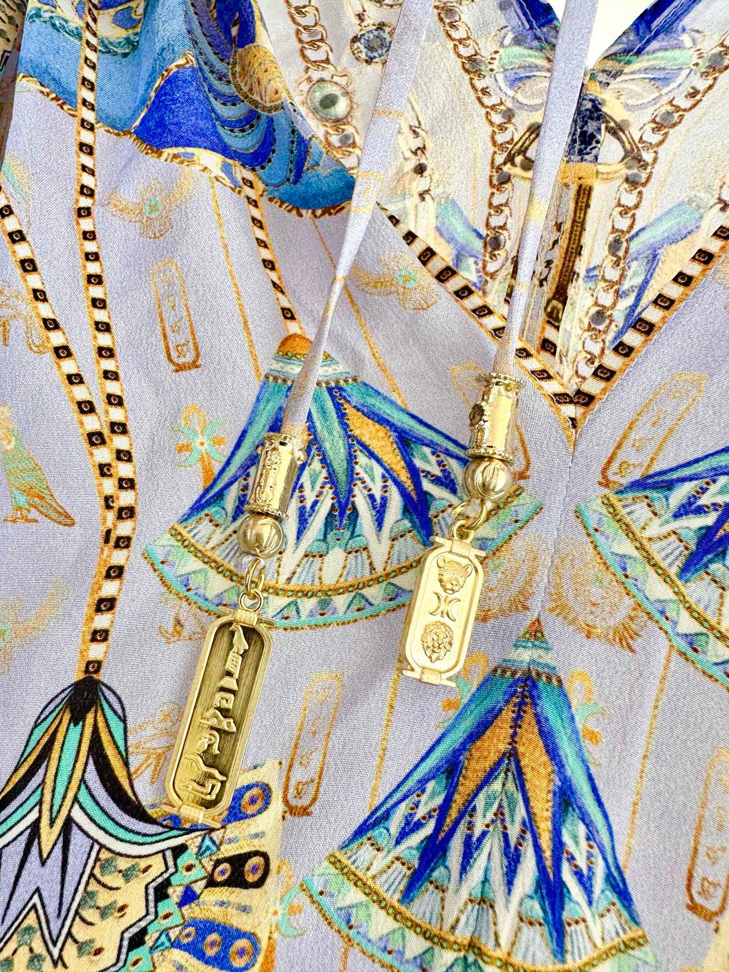 CAM: Under Scarab Skies ring detail strap dress