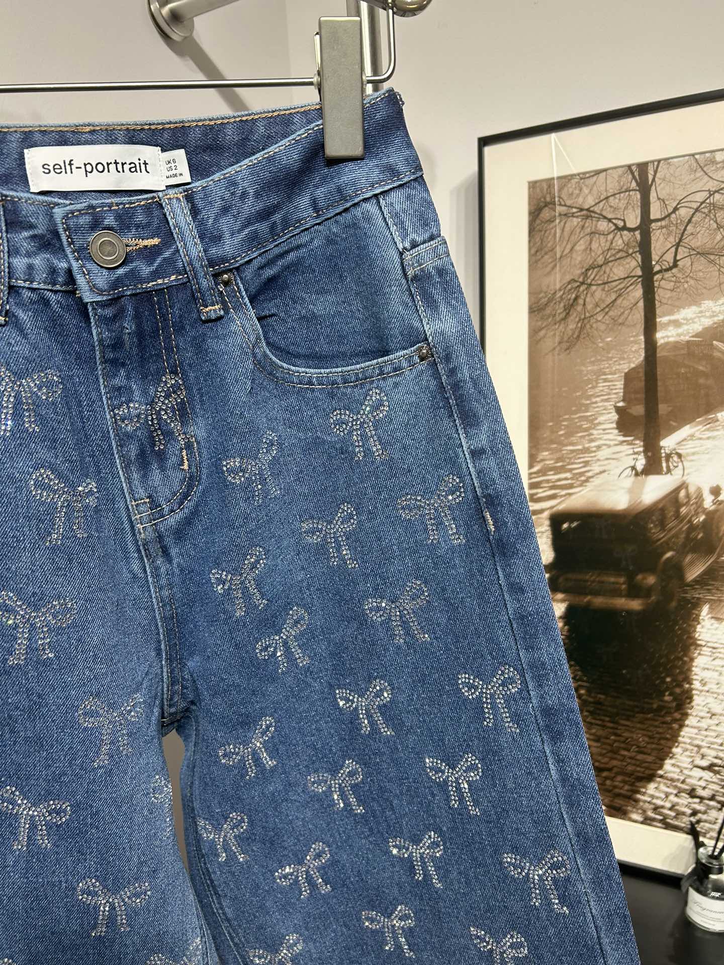 SP: Crystal-embellished high-rise wide-leg jeans